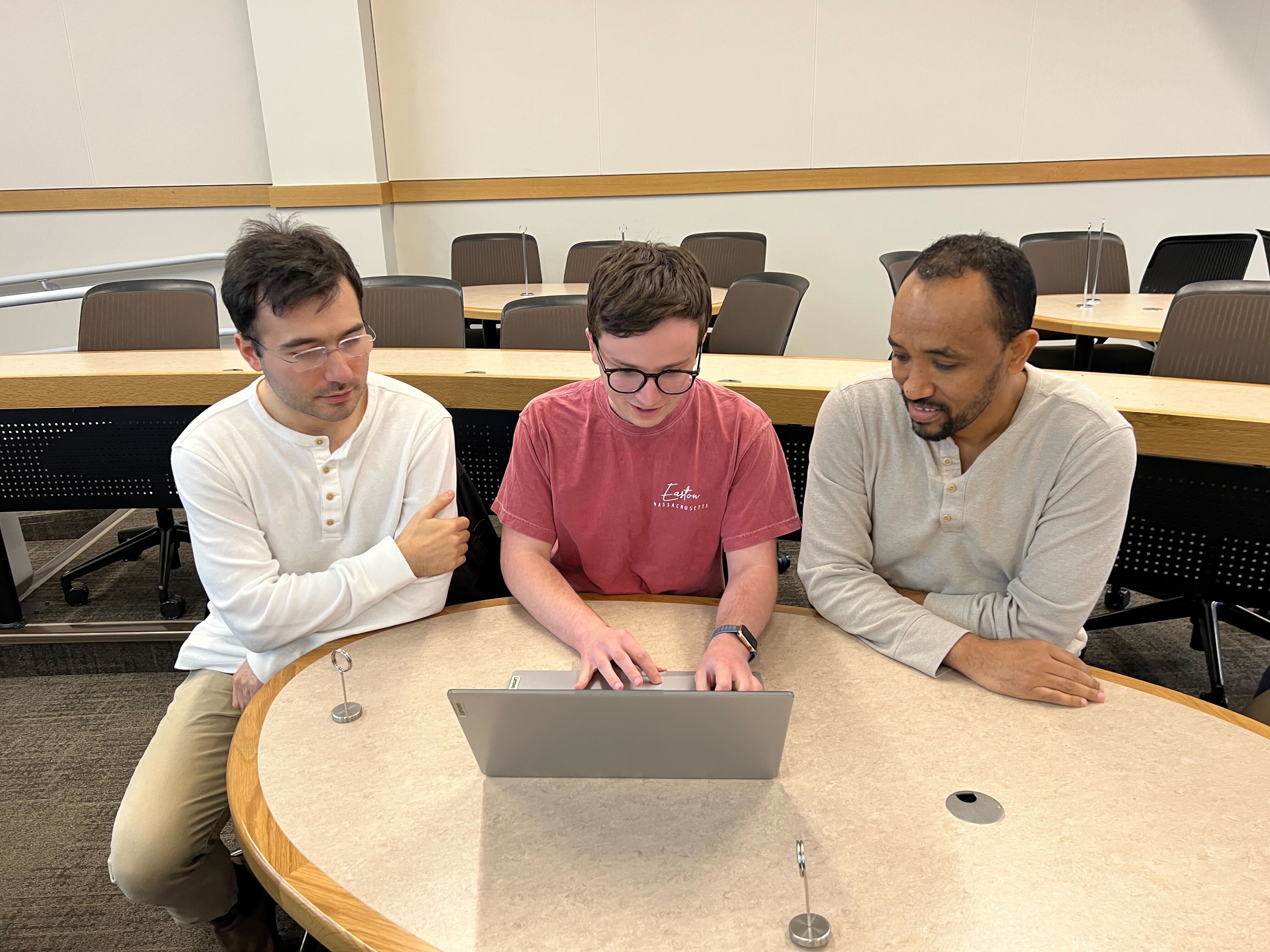 From Left to Right: Chris D'Agostino, Jeremy Tammelleo, Gashaw Ayele ...